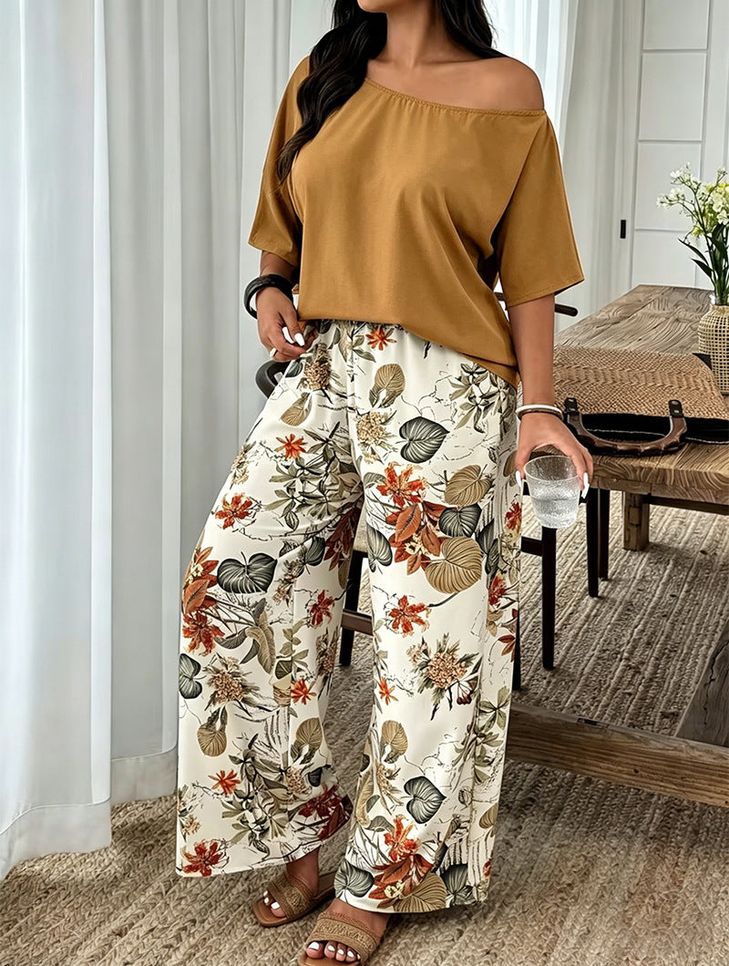 【La modă, mărimi mari】Set din 2 piese cu imprimeu (bluză cu umăr asimetric + pantaloni largi)
